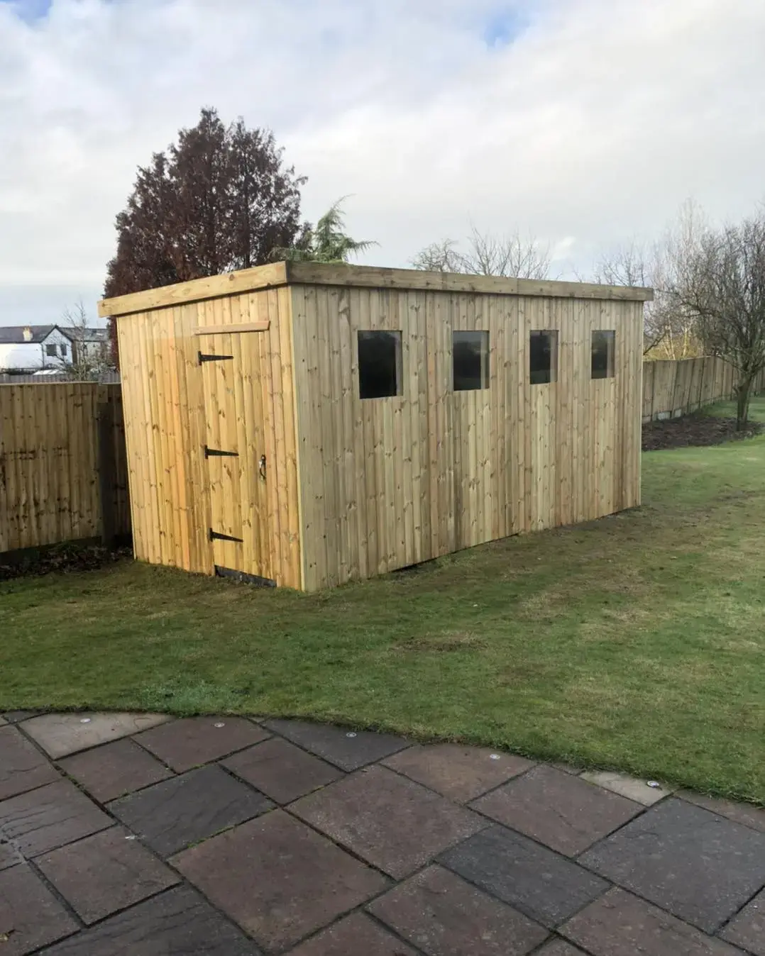 Large flat-roof timber garden shed